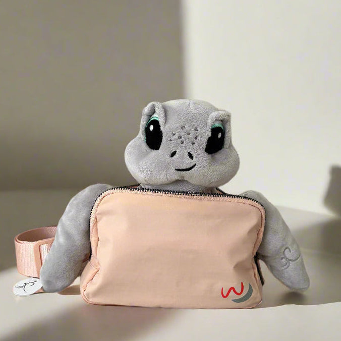 weighted sea turtle in coral pink adaptive hospital bag