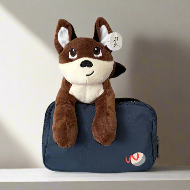 plush fox toy and navy blue adaptive fanny bag