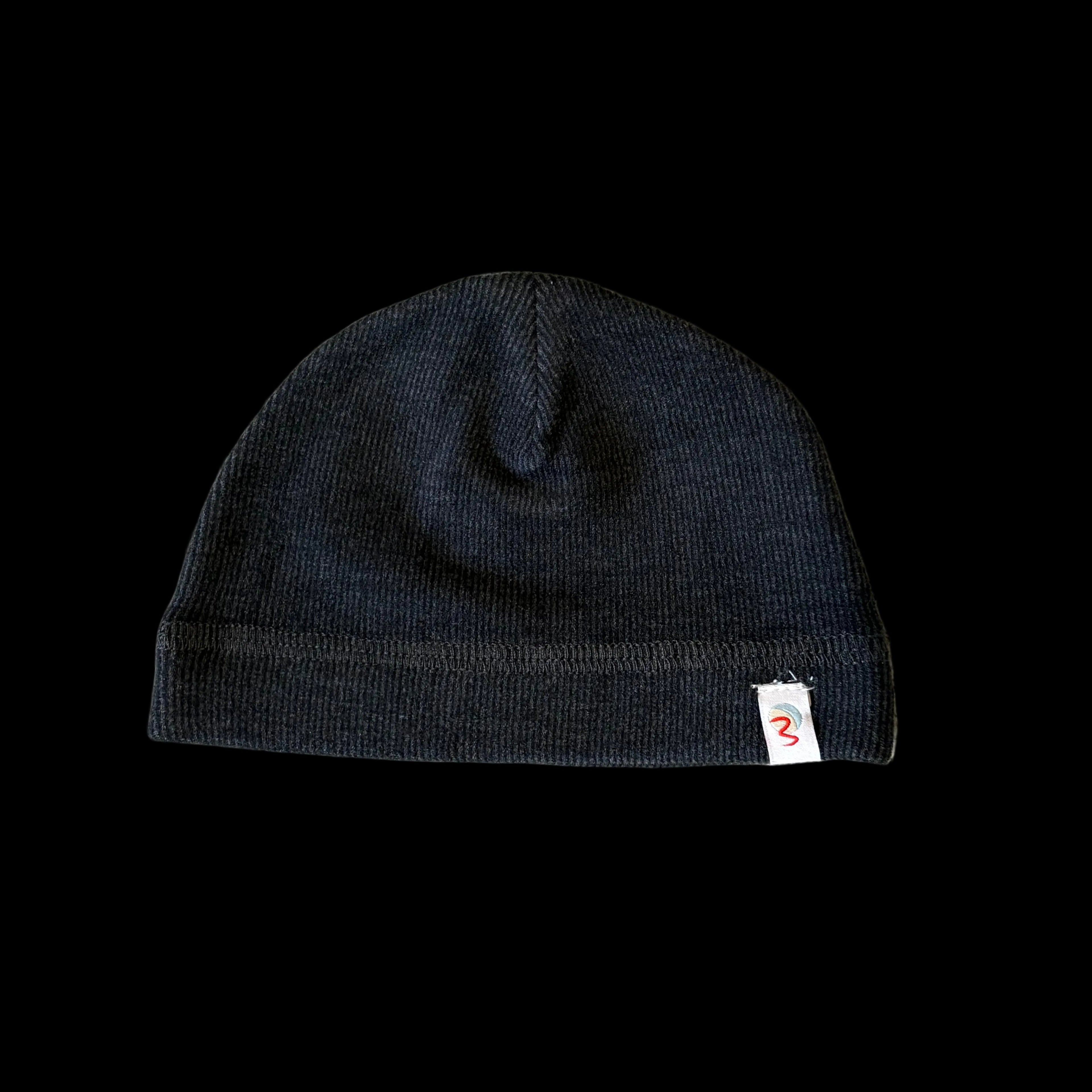 Dark grey beanie with a brand logo on a black background