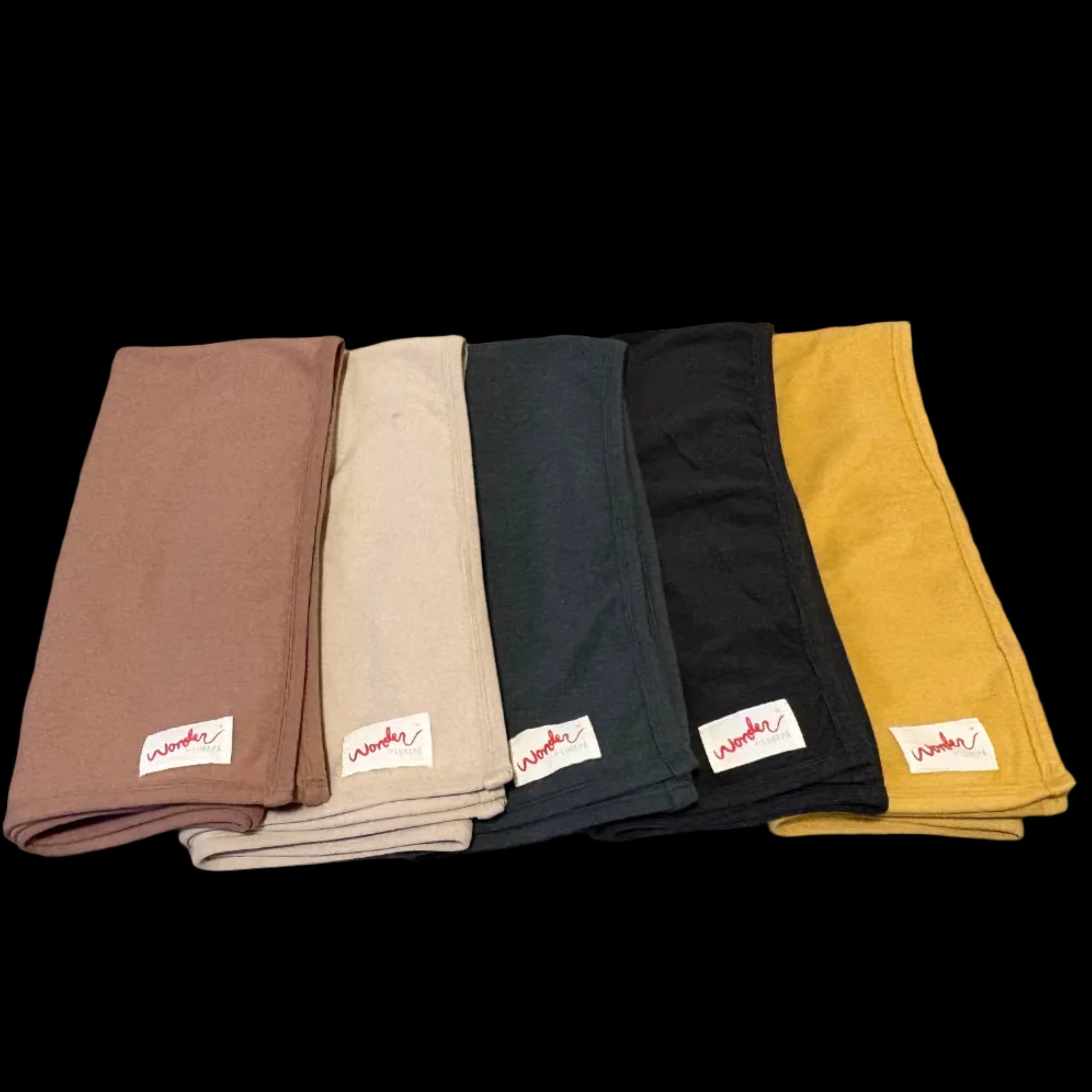 Five folded blankets in rose brown, champagne ivory, green, black, and yellow.