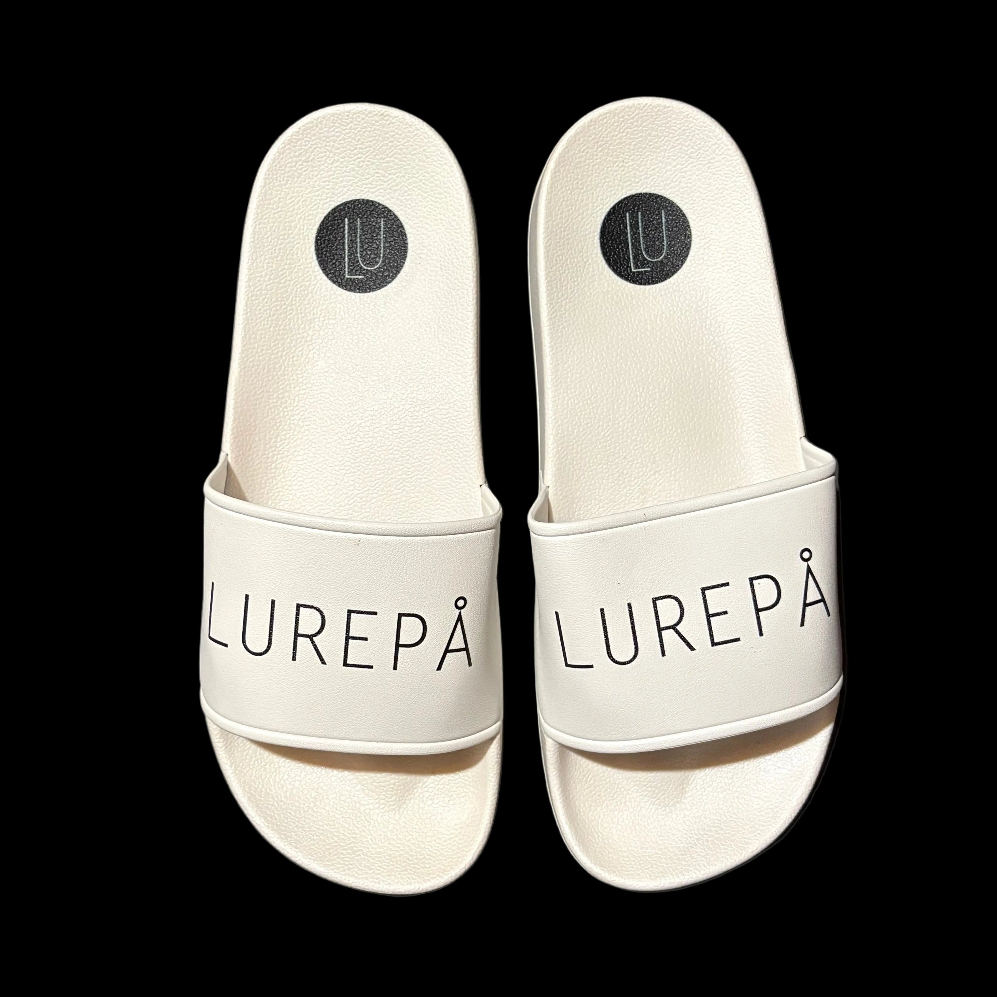 Pair of white slides with 'LUREPA' branding - top ariel view