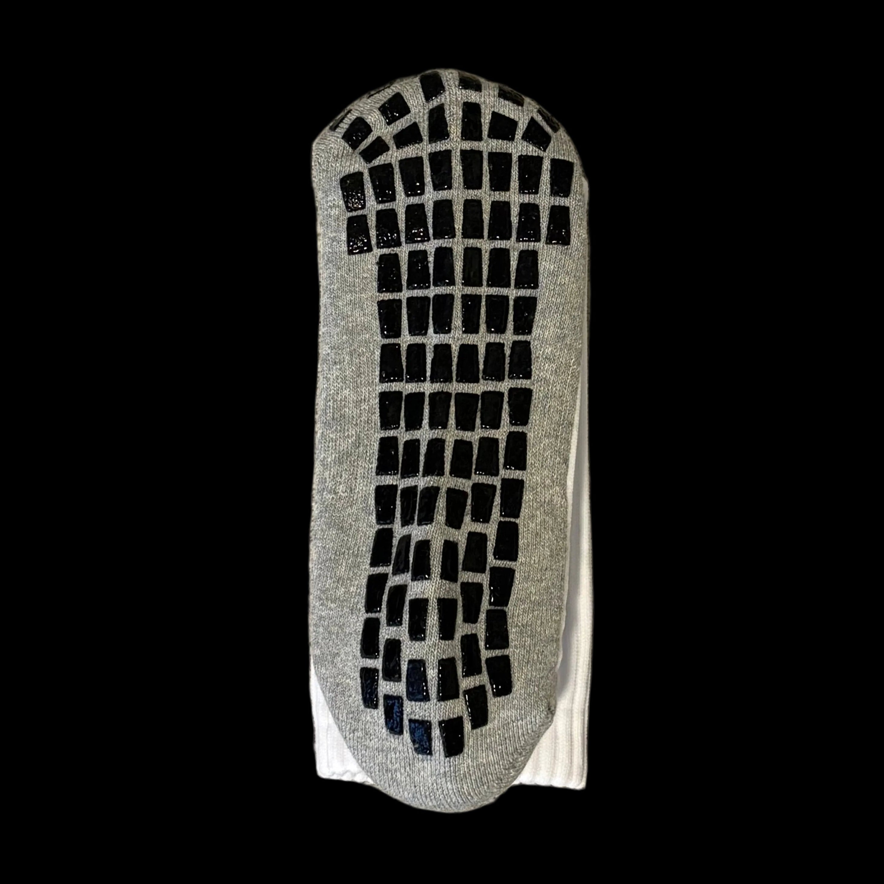Gray plastic foot sole with grid pattern as anti slip grips