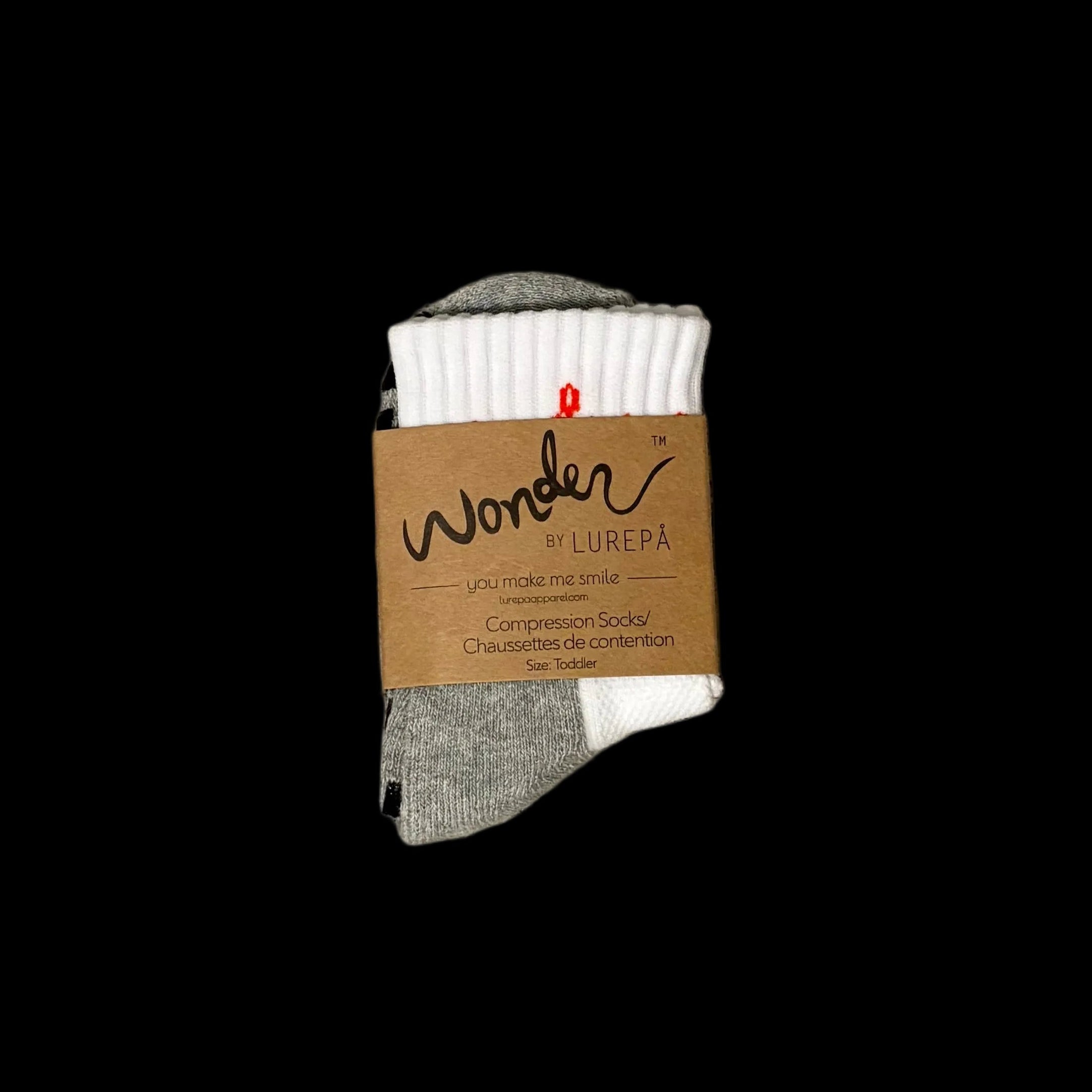 white and grey socks with brown cardboard label